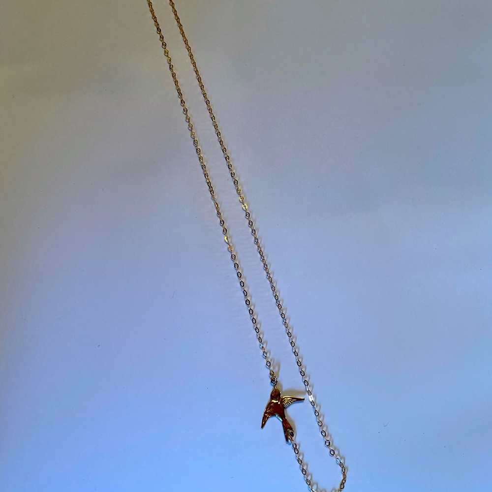 Gold swallow necklace